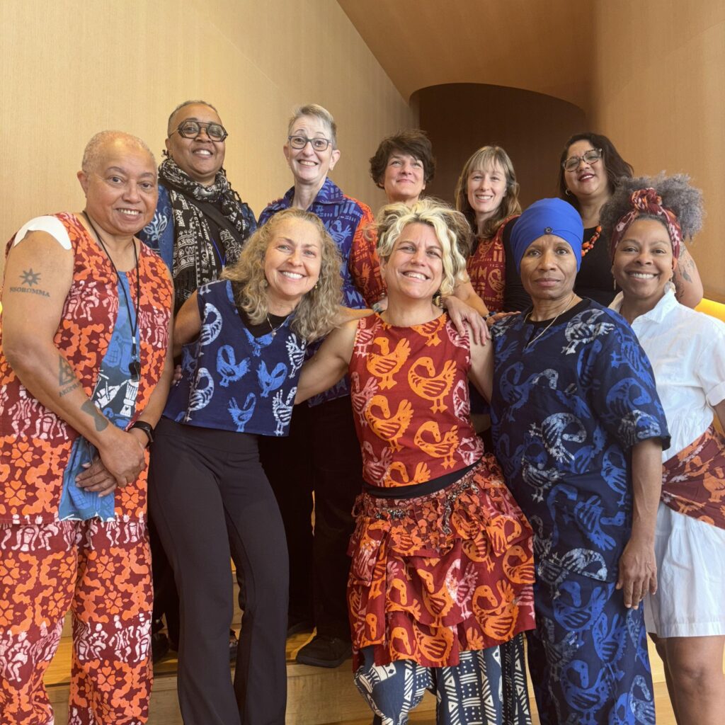 Bele Bele members posing for a group photo wearing their Batik costumes